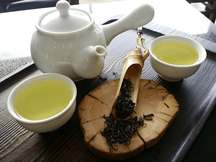 complete tea set with boiled green tea